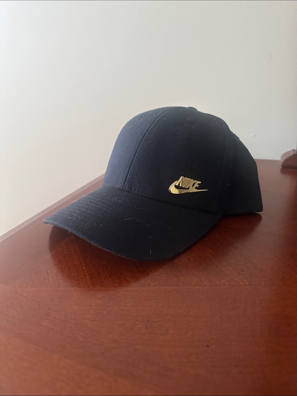 Black  Baseball Cap with Gold Swoosh Pin